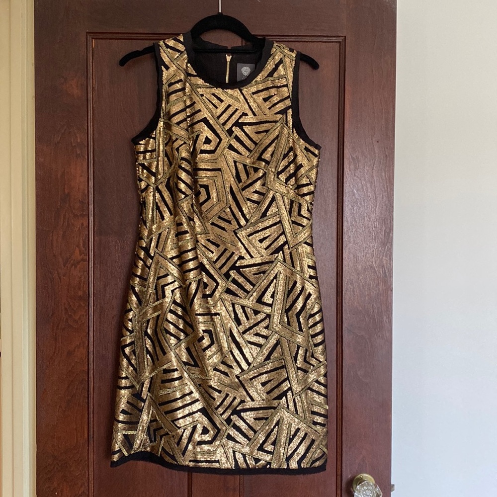 Sequined black and gold sleeveless party dress